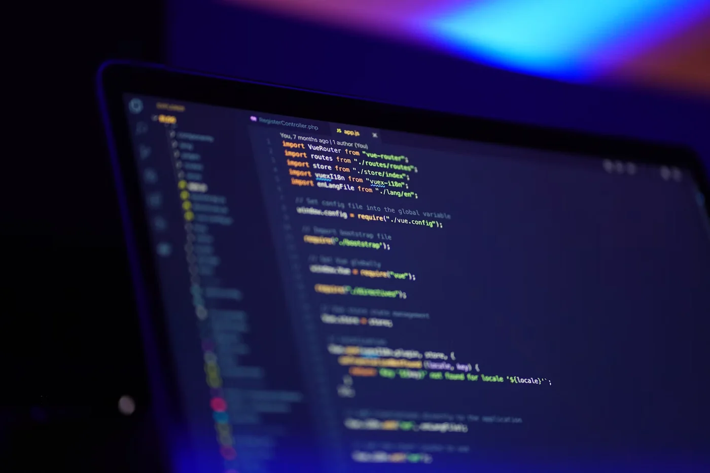 Laptop displaying website development code